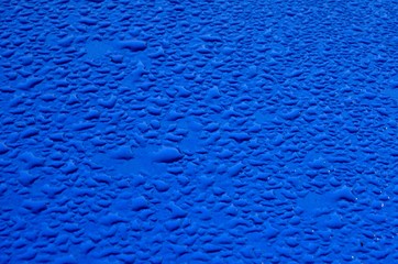 Water on blue surface