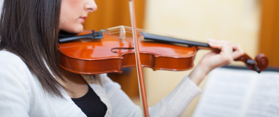 Woman playing her violin
