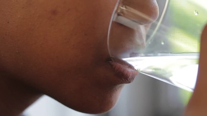 Young person drinking water