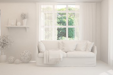 Mock up of stylish room in white color with sofa and green landscape in window. Scandinavian interior design. 3D illustration