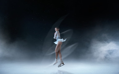 Fototapeta na wymiar Figure skating girl.