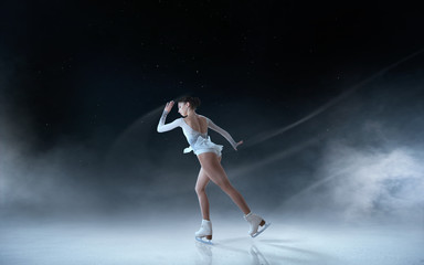 Fototapeta na wymiar Figure skating girl.
