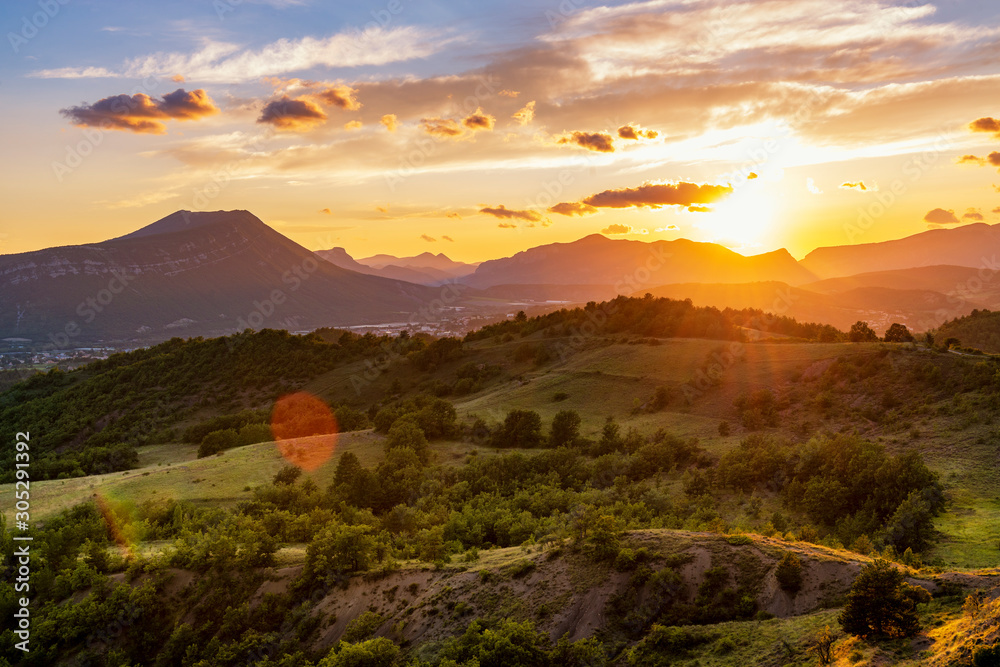 Poster beautiful sunset in the mountains of provence.