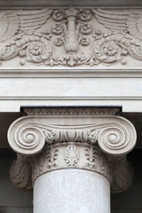 fragment of a beautiful facade of an old building with stucco molding