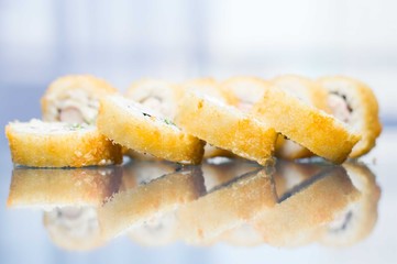 exquisite japanese sushi served on its own reflection