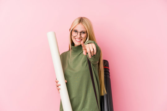 Young Blonde Architecture Student Cheerful Smiles Pointing To Front.