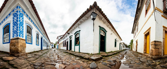 Stones street with reflection in the historical center of Paraty. World Heritage of Humanity, Rio de Janeiro, Brazil, Portuguese colonial and Brazilian imperial city where the sea invades at full tide
