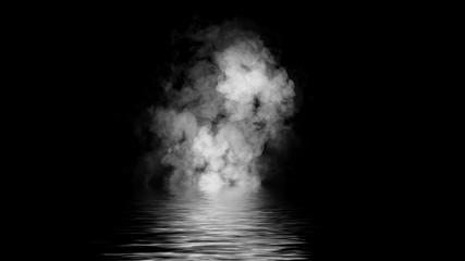 Mistery coastal fog .Smoke on the shore . Reflection in water.