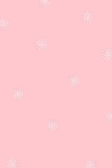 Winter pattern made of snowflakes and on pink background.