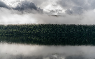 A Cloudy Dramatic Sunrise at Byers Lake Alaska