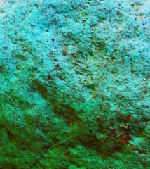 Fototapeta na wymiar Old painted granite stone rock background. Green, cyan, turquoise, aquamarine.