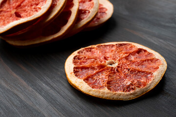Close up grapefruit (Citrus paradisi) isolate on wooden background. 