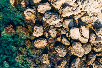 Cyprus coastline aerial top view from drone, Stone Rocks and azure mediterranean sea water in sunny day as beautiful nature resort background.