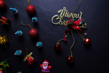 Santa Claus, merry christmas text and Decorative Christmas isolated on black background