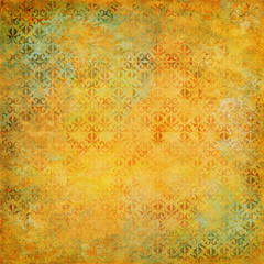 Weathered wallpaper with rusty damask pattern