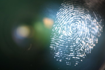 Fingerprint on a transparent surface