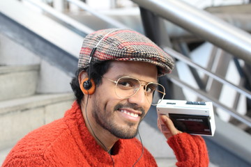 Retro looking guy listening to music