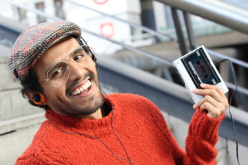 Retro looking guy listening to music 