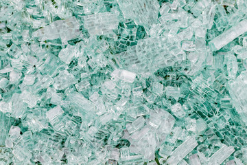 The shattered glass of the broken windshield