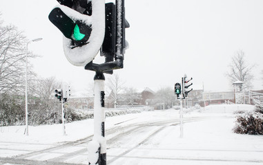 Traffic signal in snow.