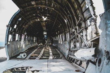 Plane wreck on Solheimasandur, Iceland. A broken airplane interior.