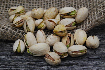Close-up of Natural Pistachio nuts on a burlap bag