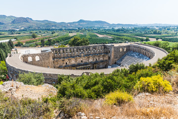 Naklejka premium Aspendos or Aspendus, an ancient Greco-Roman city in Antalya province of Turkey. The theatre hosts the annual Aspendos International Opera and Ballet Festival 