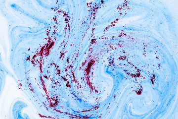 Fluid Art with pink blue color. Abstract multicolored background. Blue pink texture. Colored paint...