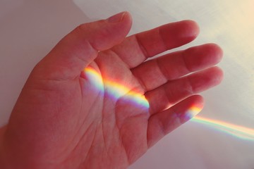 Rainbow on a man's palm 