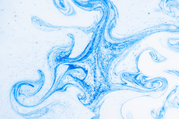 Fluid Art with white blue color. Abstract multicolored background. Blue white texture. Colored...