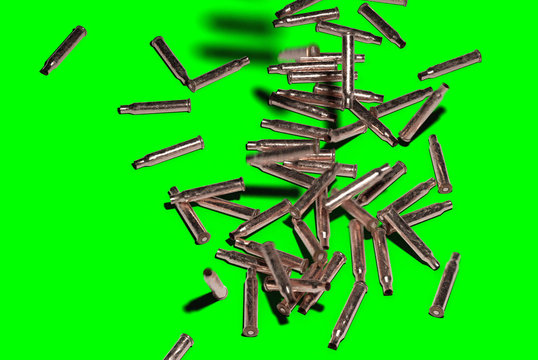 Shell Casings Falling Down on Green Screen (easy to key out) - 3D Illustration