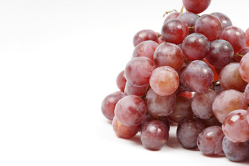 Bunch of red grape "Vitis vinifera" in isolated white background