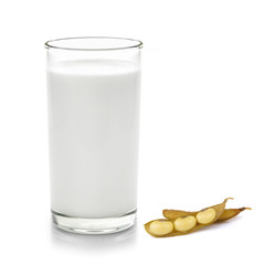glass of milk and soy bean on white background