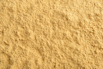 Texture of powdered garlic as background
