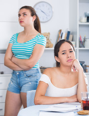 Upset teenage girls after quarrel