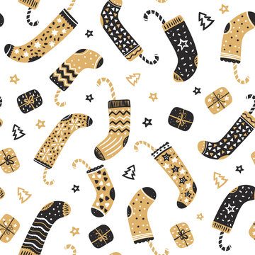 Seamless pattern of Christmas socks with candy. Vector illustration in cartoon style