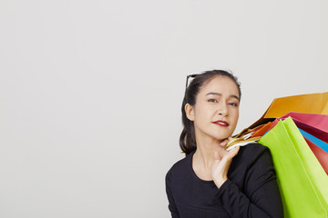 Young asia woman with colorful shopping bags