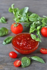 tomato jam. Jam from tomatoes with basil. Soft focus. Place for text. Copy Space.