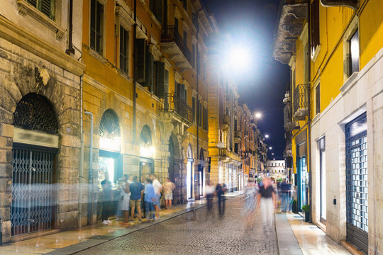 Illuminated Verona streets in night