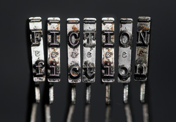the word FICTION  with old typwriter