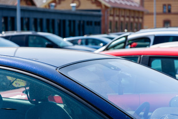 Obraz na płótnie Canvas Few uneven cars in the parking lot