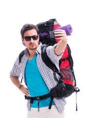 Backpacker with large backpack isolated on white