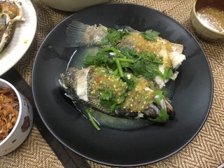 Steamed sea bass topped with spicy sauce