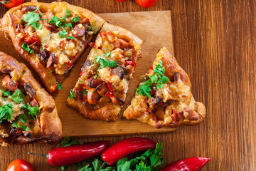 Sliced traditional Turkish pide with meat and vegetables