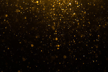 Abstract gold bokeh with black