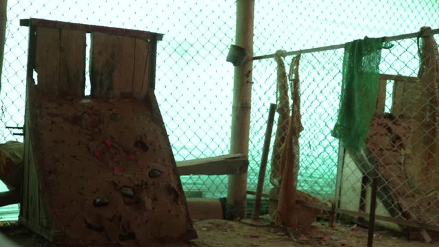 Tejo field, Colombian national sport. Tejos falling on the court with clay and exploding a wick of gunpowder. Static