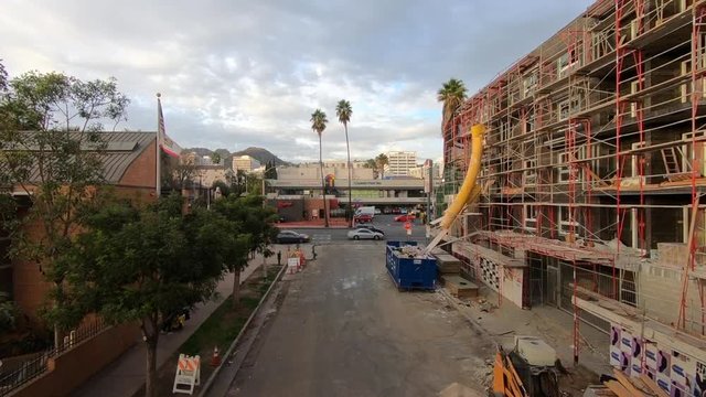 Slow motion pull back from Sunset Boulevard near Construction Site in Hollywood