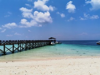 Beautiful blue sky and crystal clear water in Sipadan Island, Semporna. Sabah, Malaysia. Borneo. The Land Below The Wind.