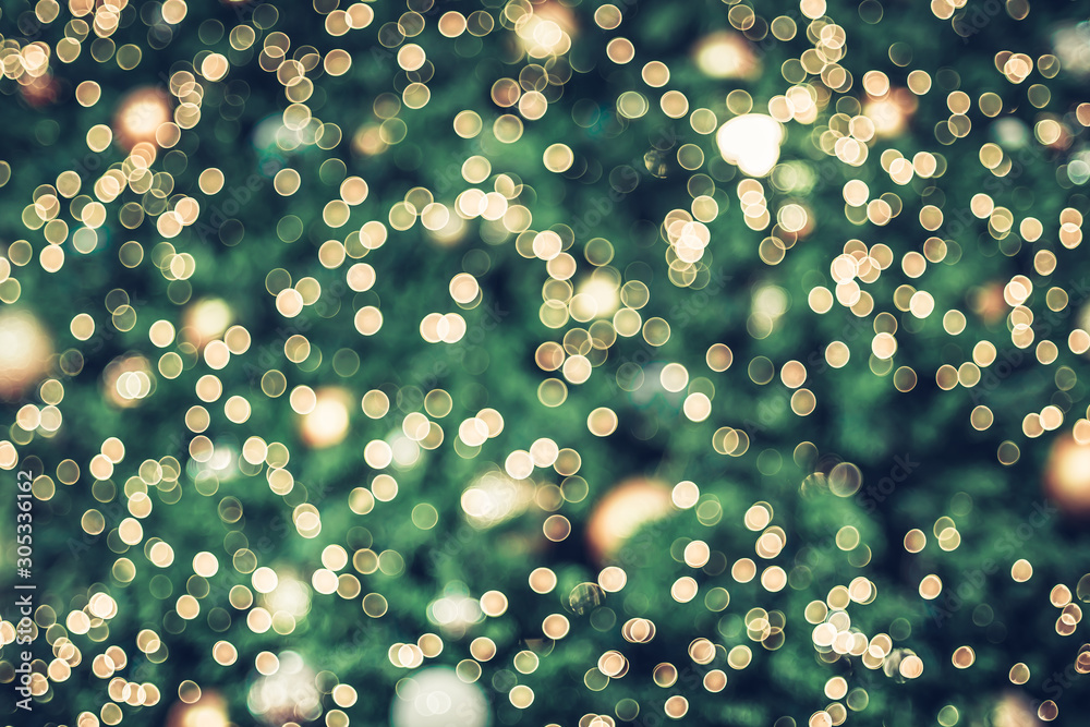 Poster abstract blur decoration ball and light string on christmas tree with bokeh light background.winter 