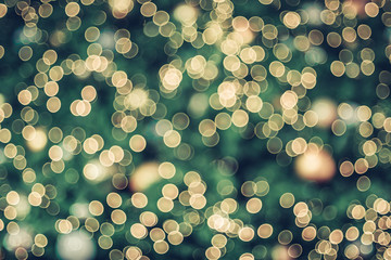 Abstract blur decoration ball and light string on christmas tree with bokeh light background.winter holiday seasonal - obrazy, fototapety, plakaty